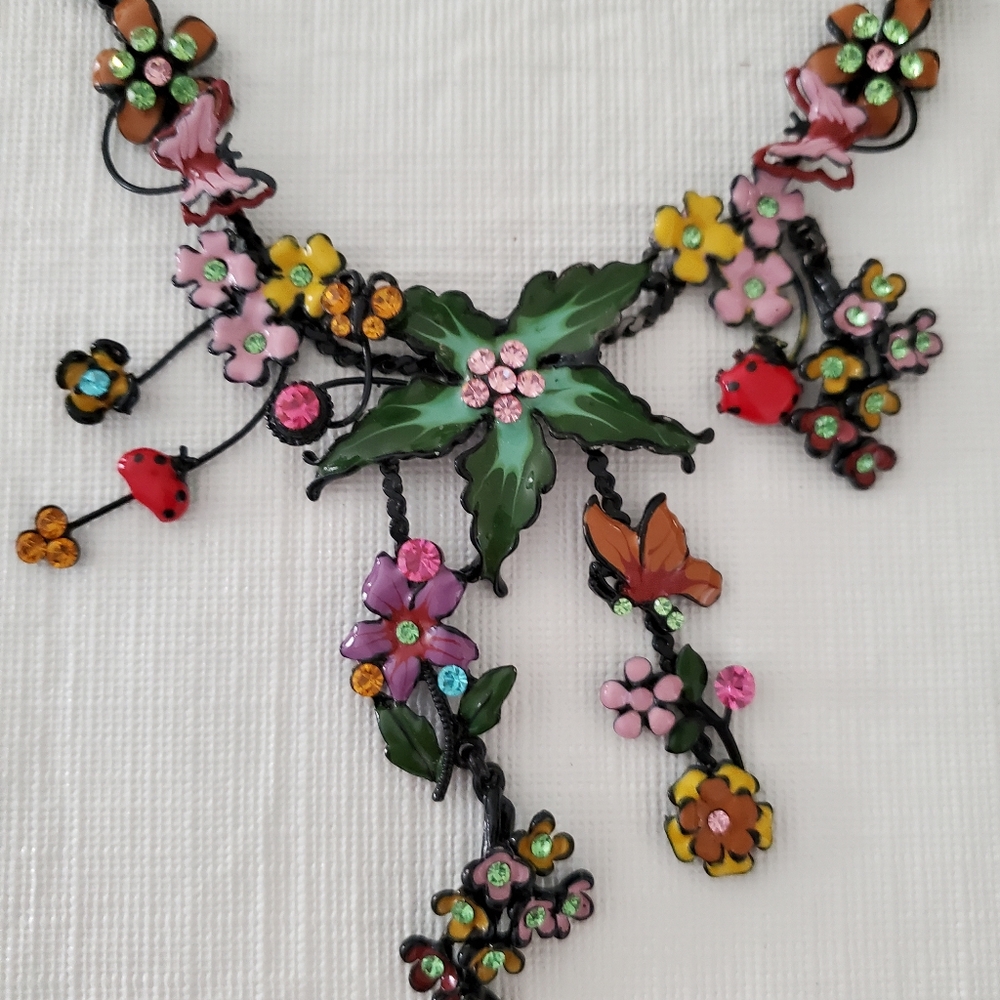 Black necklace enamel and tropical flowers with crystals